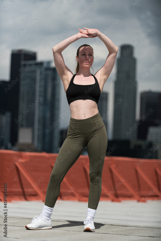 Young Athlete Warms Up on Los Angeles Rooftop Young Athlete Warms Up on Los Angeles Rooftop