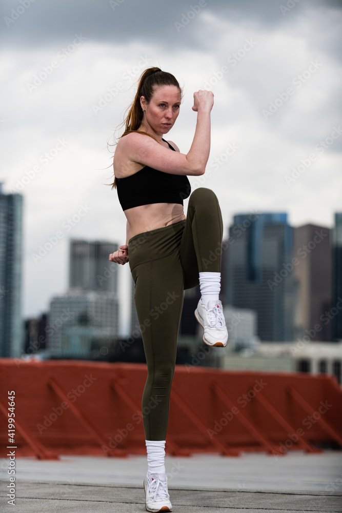 Young Athlete Warms Up on Los Angeles Rooftop