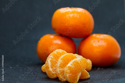 mandarin, fresh fruit black background