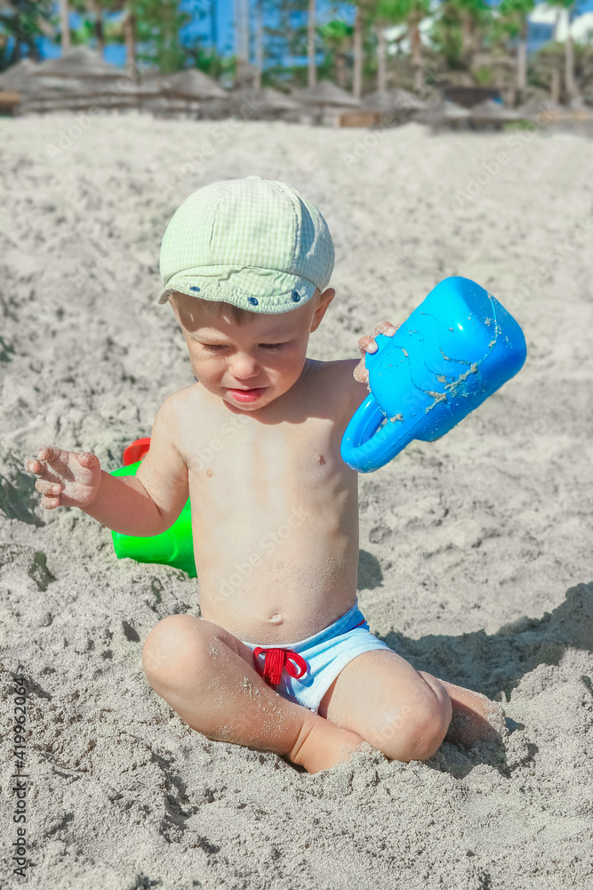 happy child playing by the sea outdoors happy child playing by the sea outdoors