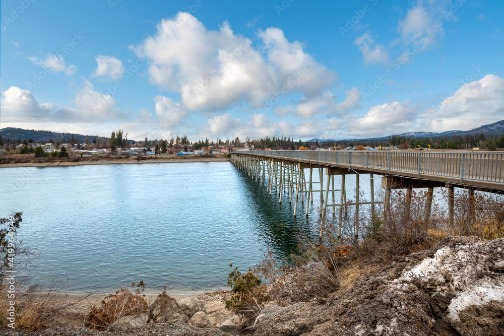 View of the Pend Oreille River and the Wisconsin Street Bridge in the historic city of Priest River, Idaho.