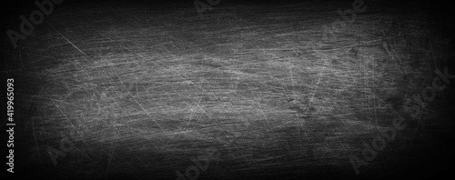 Fototapeta Naklejka Na Ścianę i Meble -  Dark, grunge and scratched chalkboard texture with empty space for text