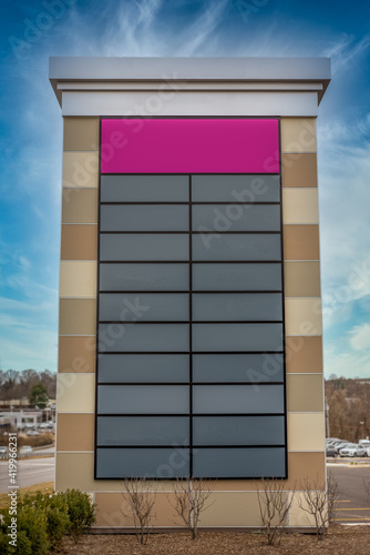 Photography Tall decorative strip mall pylon, monument, advertisement billboard sign with no