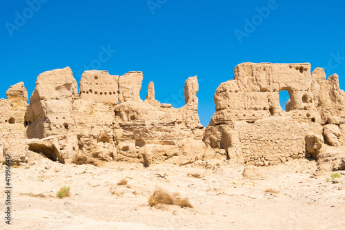 Remains of living houses in ancient town ruins laying on silk way road north west China tourist attraction
