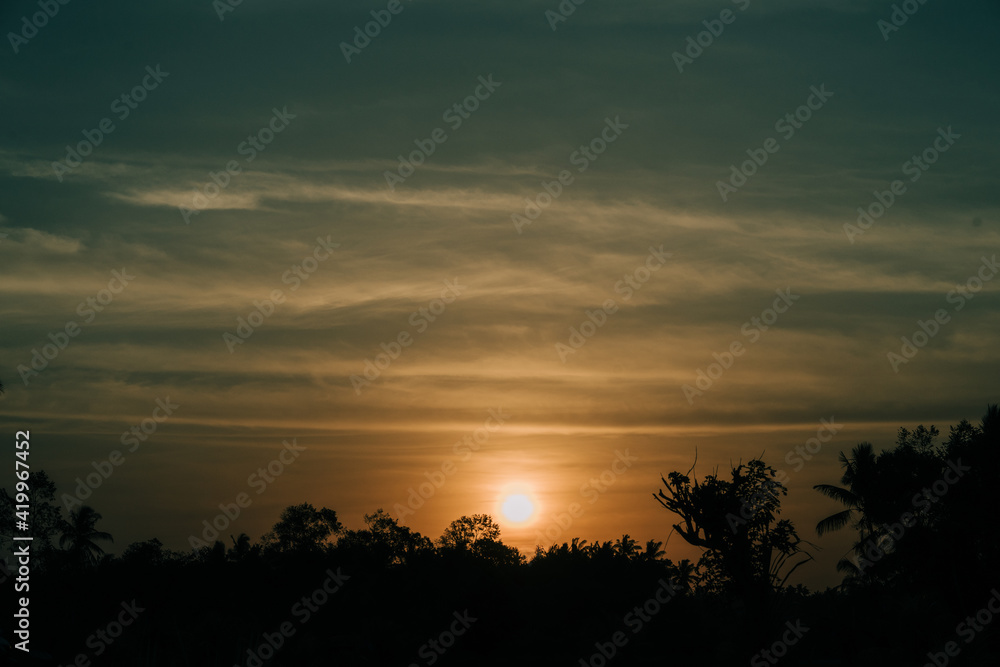 Obraz premium sunset over the river