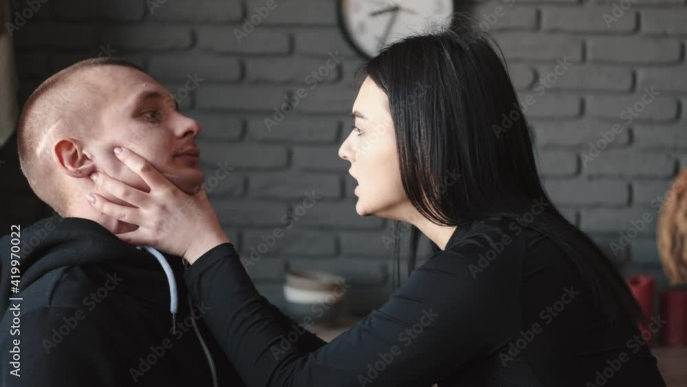 Young woman bullying her husband or boyfriends at home Young woman bullying her husband or boyfriends at home