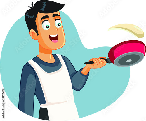 Happy Man Flipping Pancakes Making Breakfast
