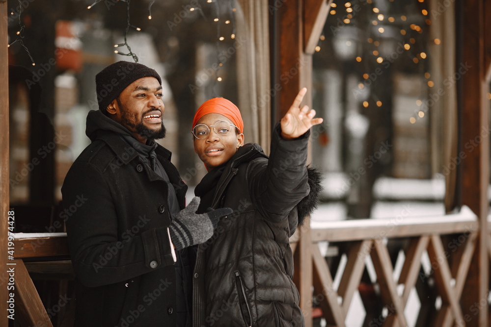 African american couple in a winter city