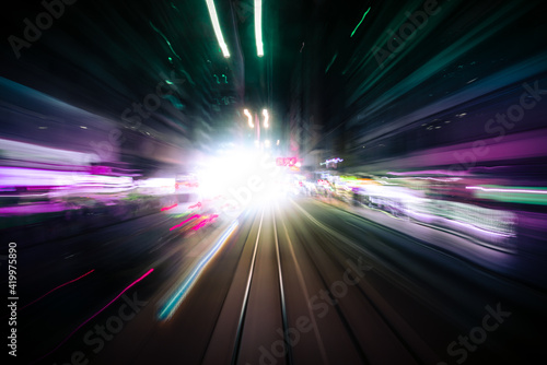 Fototapeta Naklejka Na Ścianę i Meble -  Moving forward motion blur background with light trails
