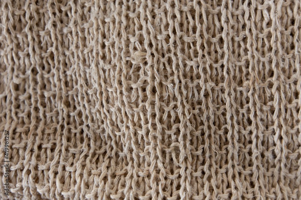 Natural fabric handmade from rough hemp thread.