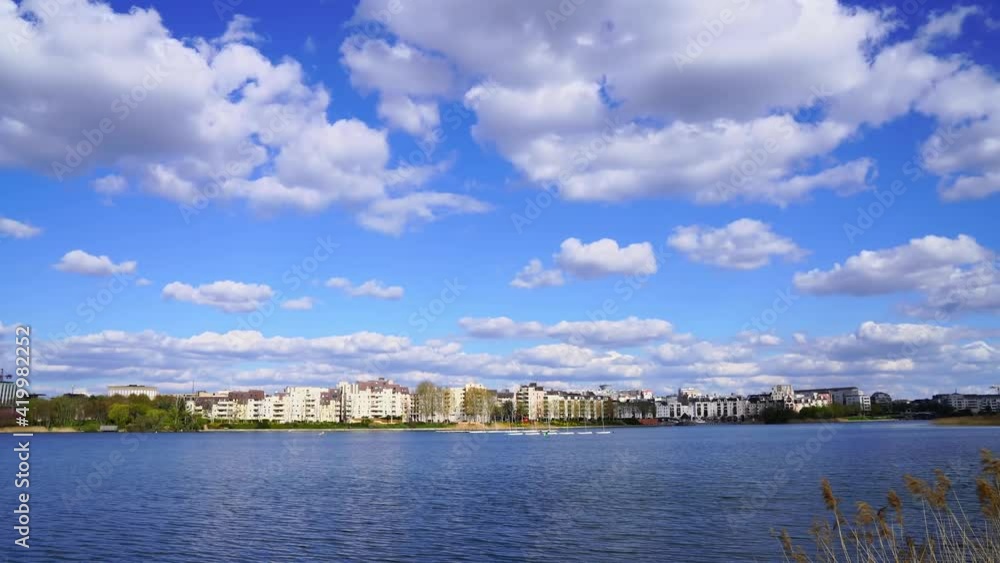 Beautiful Lac de Créteil under blue sky and white clouds in Paris, France Beautiful Lac de Créteil under blue sky and white clouds in Paris, France