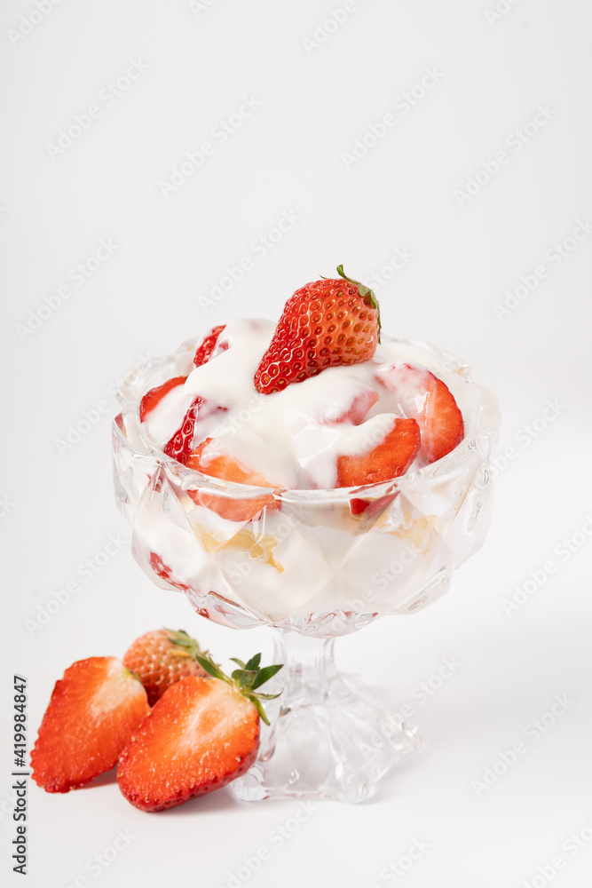 Fresh strawberry fruit salad on pure white background Fresh strawberry fruit salad on pure white background