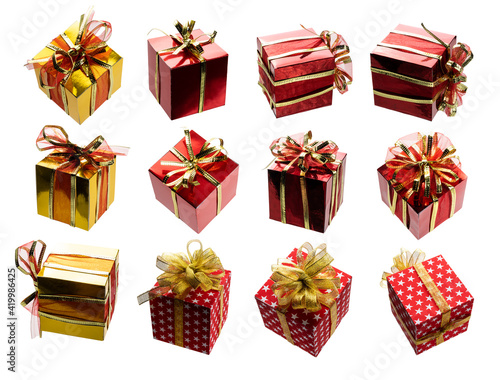 A set of different angles of red and gold gift boxes on a white background