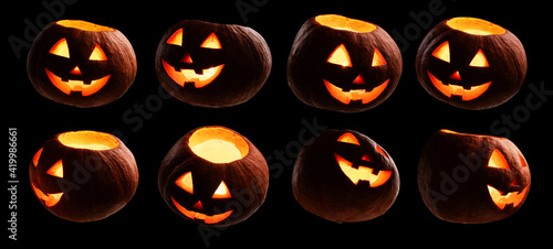 A set of glowing pumpkins. Isolated on a black background