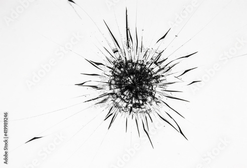 Cracks on the glass of the protective screen of the phone. Broken smartphone glass on a white background.