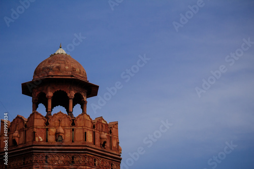 India travel tourism background - Red Fort (Lal Qila) Delhi - World Heritage Site. Inside view of the Red Fort, ancient tower of red stone in the fortress the dom