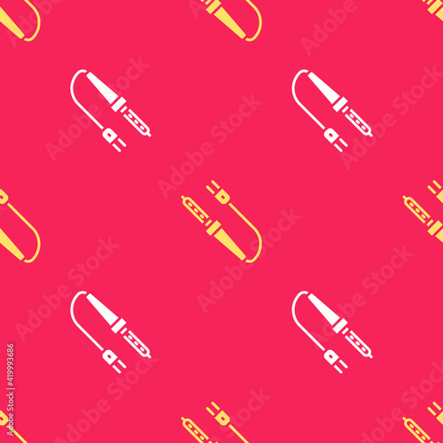Yellow Soldering iron icon isolated seamless pattern on red background. Vector