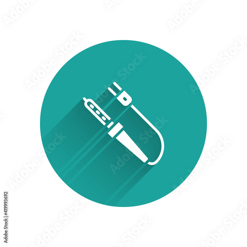 White Soldering iron icon isolated with long shadow. Green circle button. Vector
