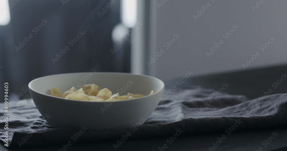 fettuccine in white bowl on linen cloth fettuccine in white bowl on linen cloth