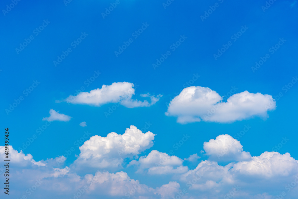 White clouds floating on blue sky background White clouds floating on blue sky background