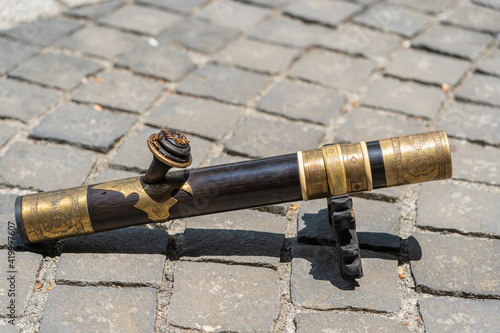 Photography The ancient smoking pipe for opium on the sidewalk, Da Nang, Vietnam