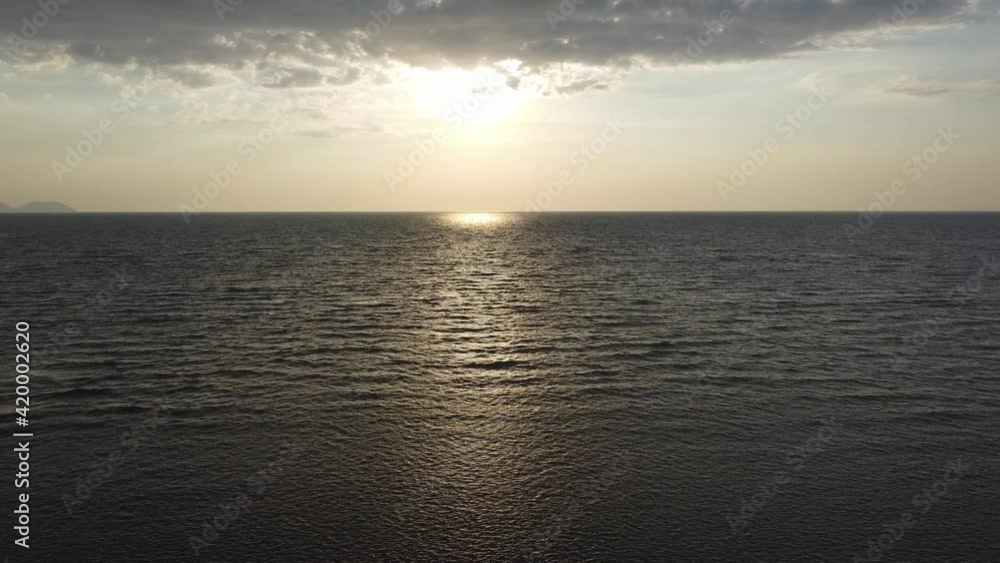 Aerial view golden idyllic sunset over sea Aerial view golden idyllic sunset over sea