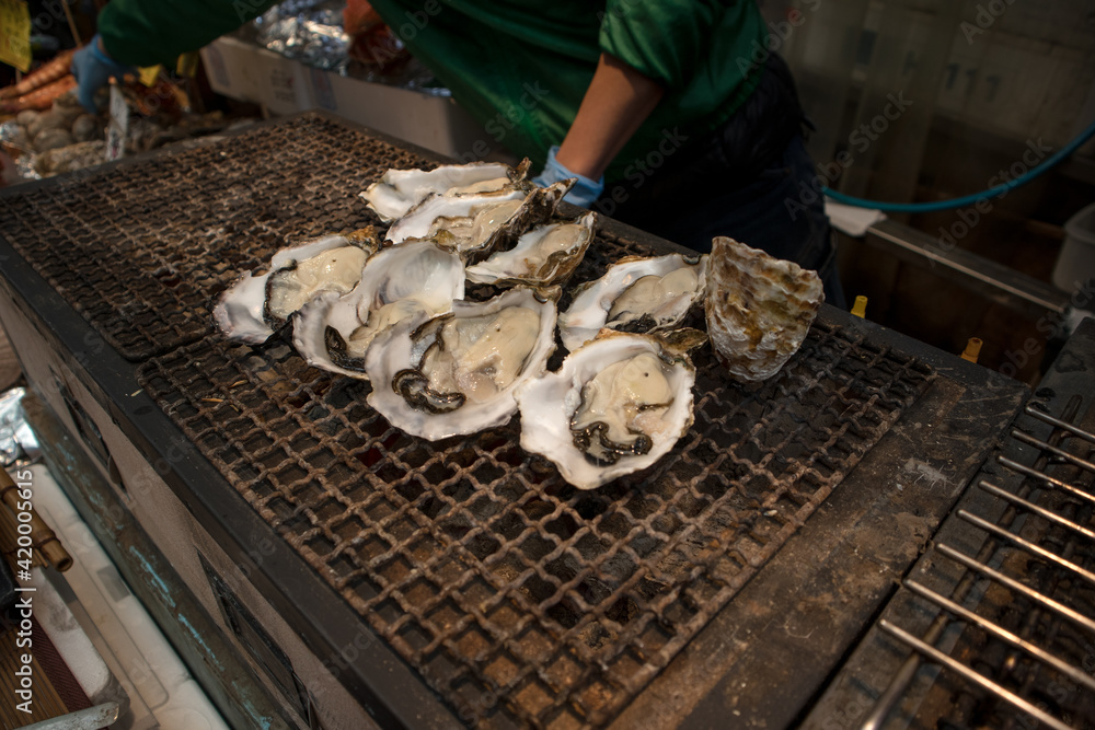 oyster as street food and bbq  in Osaka, Japan.
