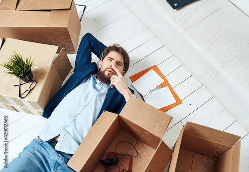 Business man with boxes office moving office official photo