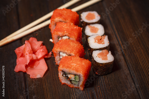 sushi rolls wooden sticks seafood filling delicacy asian food