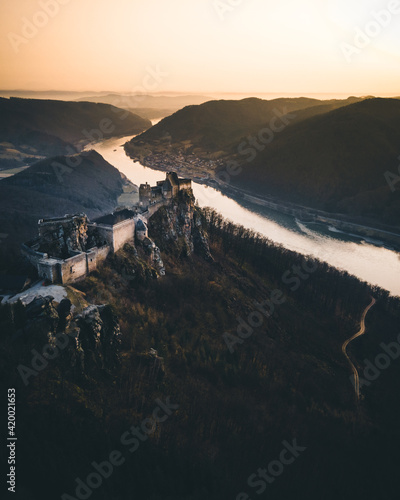 Aggstein castle ruin and Danube river at sunset in Wachau, Austria during spring photo