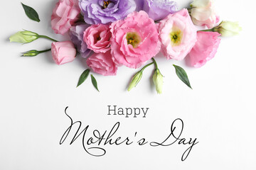 Happy Mother's Day. Beautiful eustoma flowers on white background, top view