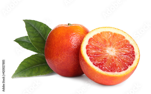 Delicious ripe red oranges on white background