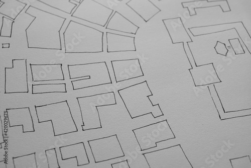 Urbanism, development of ideas for cities and towns by sketching with ink on paper