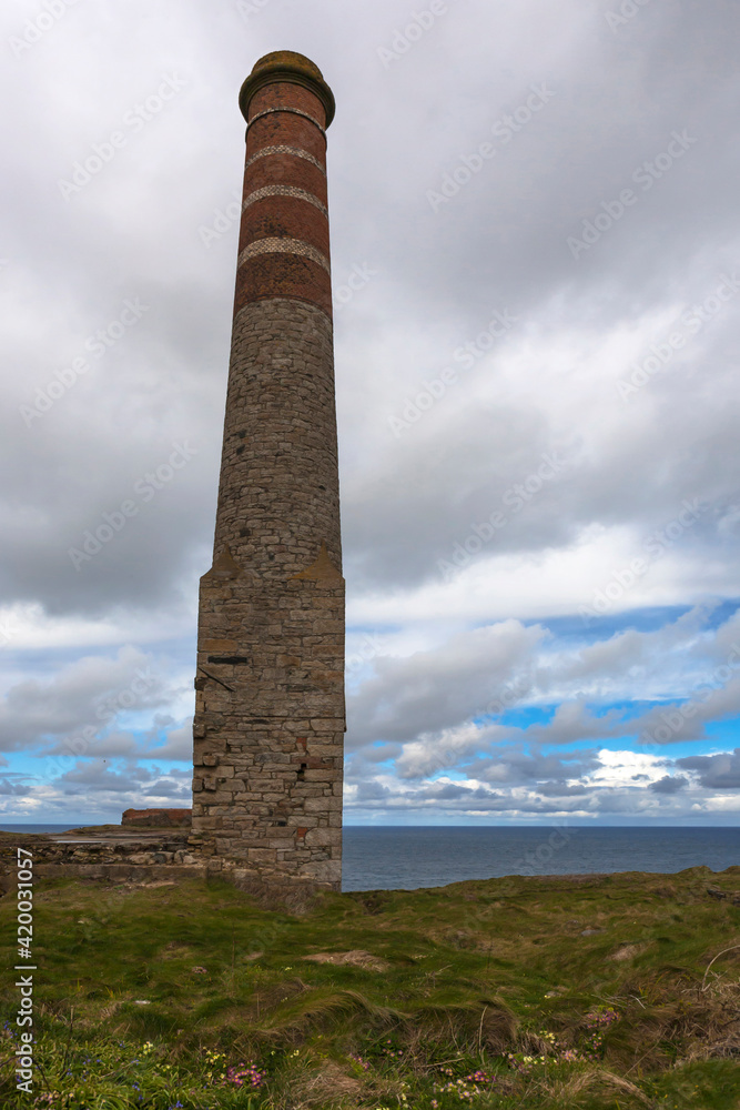 Compressor house chimney of the abandoned Levant Mine, Penwith Peninsula, Cornwall, UK