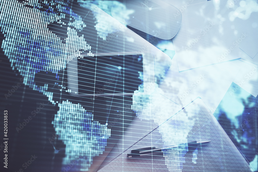 Double exposure of business theme hologram over desktop with phone. Top view. Mobile international trade connection concept. Double exposure of business theme hologram over desktop with phone. Top view. Mobile international trade connection concept.
