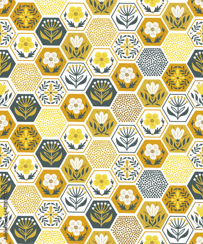 Decorative floral honeycomb tiled vector seamless pattern. Folksy hexagonal mosaic tessellated ornament. Ornate honeycomb tiles surface print design