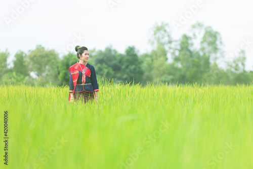 Portrait of asian girl with Thai local traditional dress, famous in countryside of Thailand