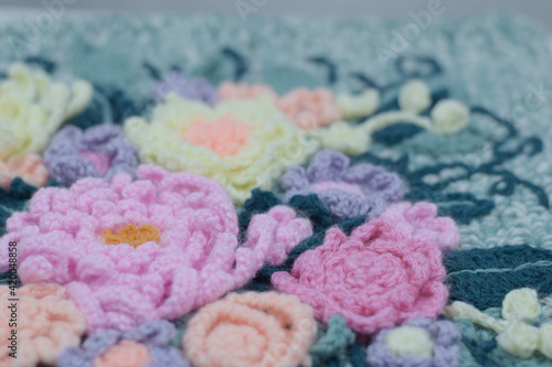 Multicolored background made from handcrafted flowers.