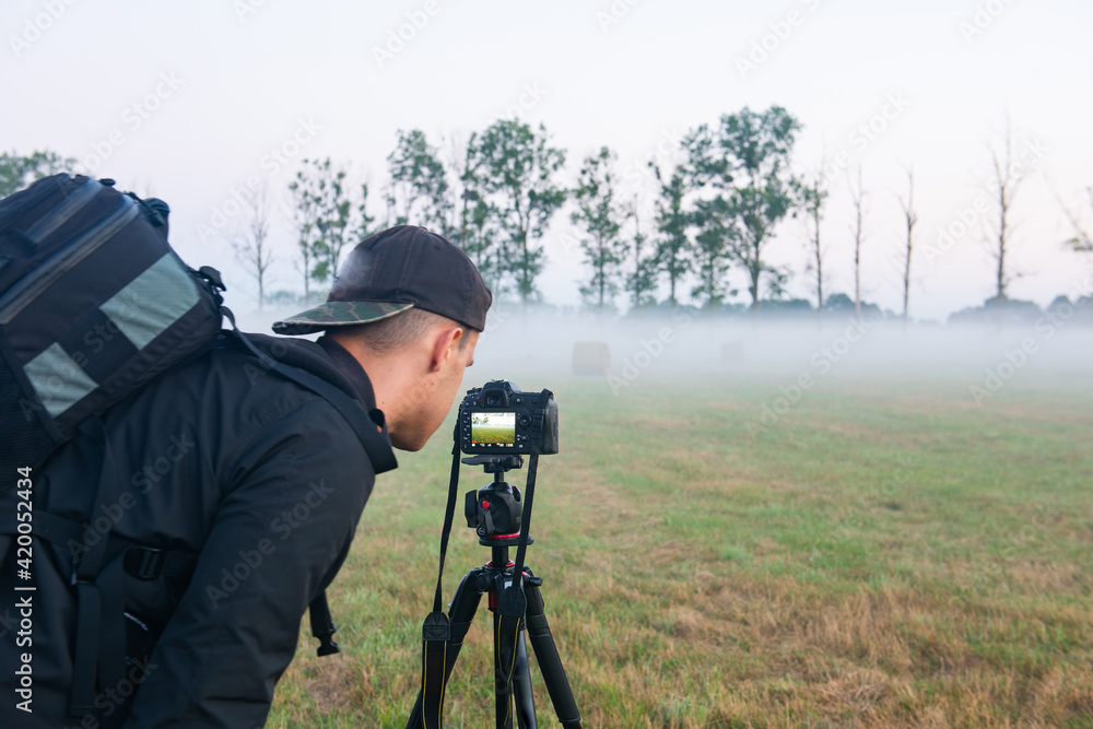 Photographer's boyfriend takes a photo of landscape