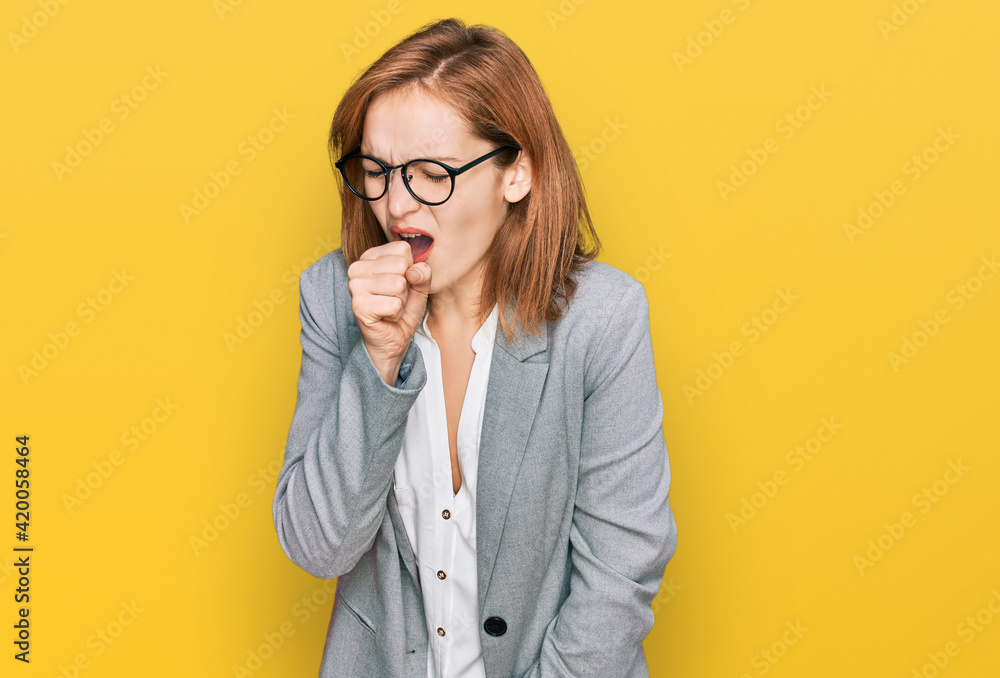Young caucasian woman wearing business style and glasses feeling unwell and coughing as symptom for cold or bronchitis. health care concept. Young caucasian woman wearing business style and glasses feeling unwell and coughing as symptom for cold or bronchitis. health care concept.