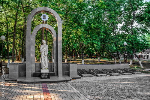 Kherson  Ukraine - July 22  2020  Sculpture  Kalina of Fate  in honor of the policemen who died in the line of duty in Kherson. Female figure made of solid Inkerman stone and memorial stones