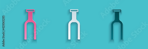 Paper cut Bicycle suspension fork icon isolated on blue background. Sport transportation spare part steering wheel. Paper art style. Vector