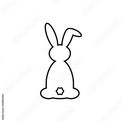 Silhouette of a cute rabbit. Easter holiday. Rabbit from the back. Isolated vector illustration. Christmas. Close-up. Isolated background. Black and white color. © Yulia