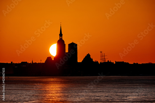 silhouette of city of Stralsund with sunset