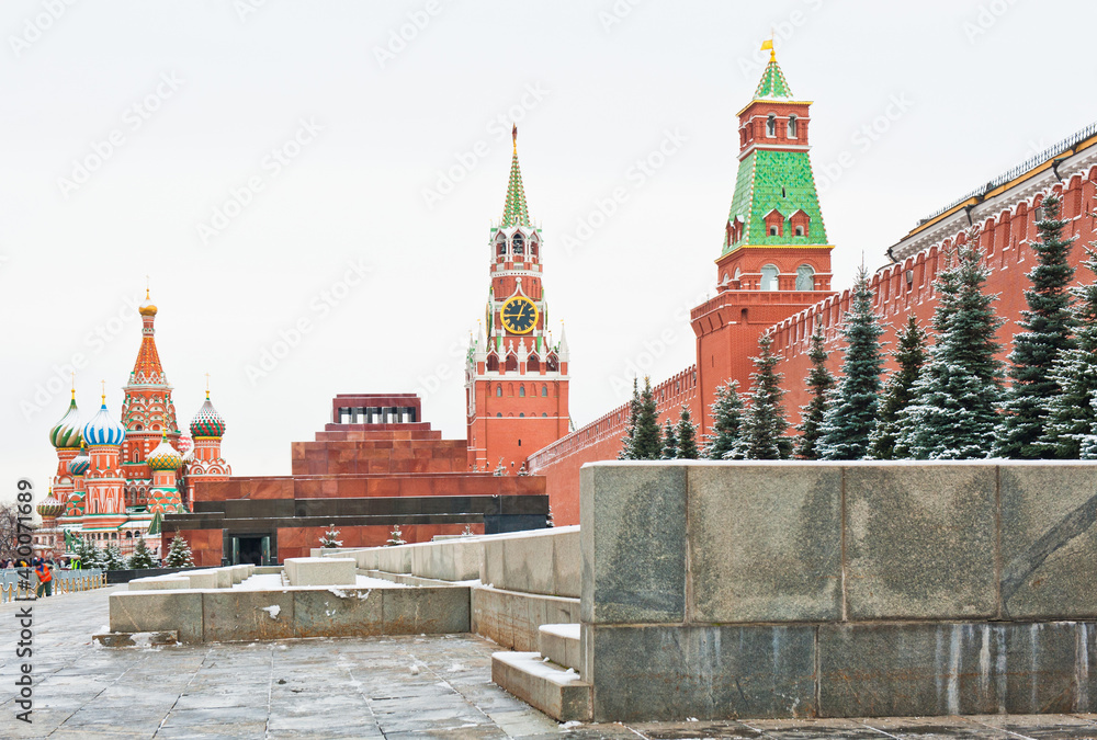 Spasskaya Tower and the Cathedral of Vasily the Blessed (Saint Basil's Cathedral). Red square. Winter day. Moscow. Russia Spasskaya Tower and the Cathedral of Vasily the Blessed (Saint Basil's Cathedral). Red square. Winter day. Moscow. Russia
