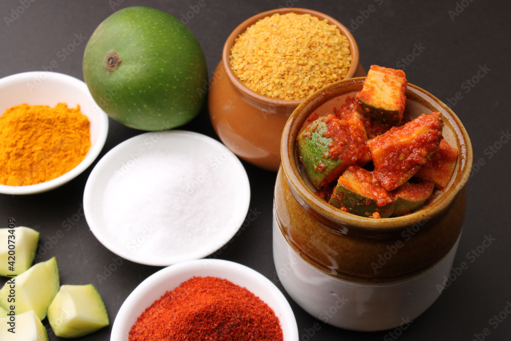 Homemade Mango Pickle or aam ka achar Kairi Loncha with Ingredients.