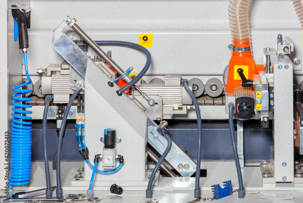 Power unit with motors and mechanisms of a machine for the production of cabinet furniture. Power unit with motors and mechanisms of a machine for the production of cabinet furniture.