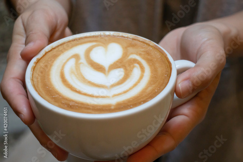 Handcraft of hot milk coffee cup