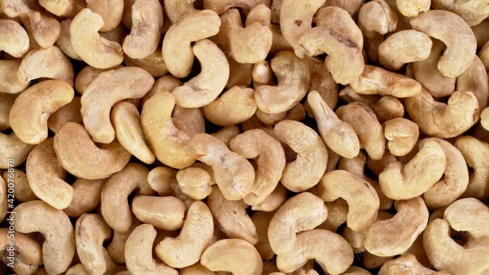 Super Slow Motion Shot of Moving Raw Cashews Super Slow Motion Shot of Moving Raw Cashews