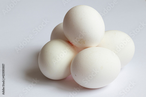 Large selection of fresh chicken eggs for cooking.